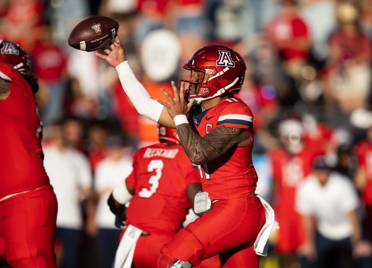 Nov 30, 2024; Tucson, Arizona, USA; Arizona Wildcats quarterback Noah Fifita (11) against the Arizona State Sun Devils in the second half during the Territorial Cup at Arizona Stadium. Mandatory Credit: Mark J. Rebilas-Imagn Images