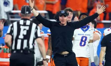 Dec 31, 2024; Glendale, AZ, USA; Boise State Broncos head coach Spencer Danielson reacts toward the referee against the Penn State Nittany Lions during the first half in the Fiesta Bowl at State Farm Stadium. Mandatory Credit: Mark J. Rebilas-Imagn Images