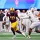 Jan 1, 2025; Atlanta, GA, USA; Arizona State Sun Devils quarterback Sam Leavitt (10) looks to pass the ball against Texas Longhorns linebacker Anthony Hill Jr. (0) during the second half of the Peach Bowl at Mercedes-Benz Stadium. Mandatory Credit: Brett Davis-Imagn Images