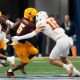 Arizona State wide receiver Melquan Stovall (5) is tackled by Texas defensive back Michael Taaffe (16) after a catch during the fourth quarter in the Chick-fil-A Peach Bowl. The play was reviewed for targetting but was not called.