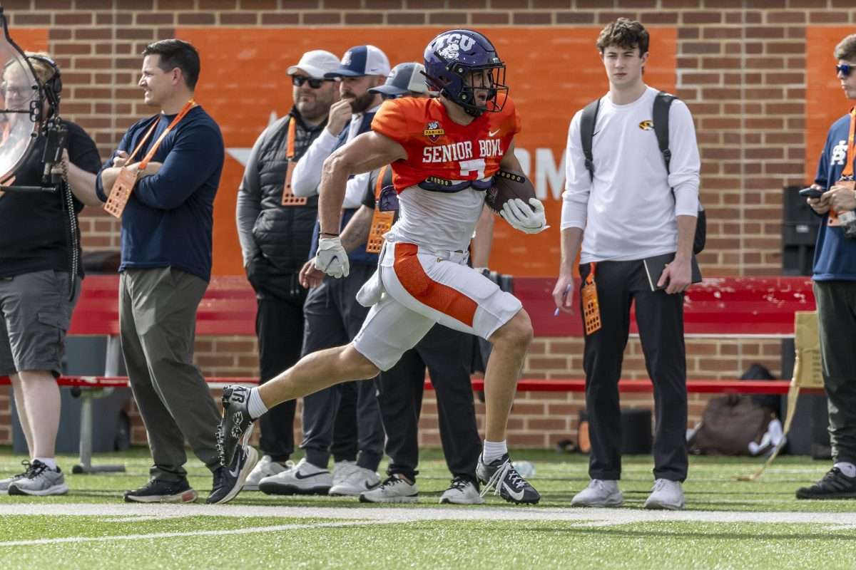 Jan 29, 2025; Mobile, AL, USA; American team wide receiver Jack Bech of TCU (7) runs after a catch during Senior Bowl practice for the American team at Hancock Whitney Stadium. Mandatory Credit: Vasha Hunt-Imagn Images