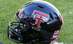Nov 30, 2024; Lubbock, Texas, USA; A general view of a Texas Tech Red Raiders helmet on the field before the game between the West Virginia Mountaineers and the Texas Tech Red Raiders at Jones AT&T Stadium and Cody Campbell Field. Mandatory Credit: Michael C. Johnson-Imagn Images