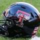 Nov 30, 2024; Lubbock, Texas, USA; A general view of a Texas Tech Red Raiders helmet on the field before the game between the West Virginia Mountaineers and the Texas Tech Red Raiders at Jones AT&T Stadium and Cody Campbell Field. Mandatory Credit: Michael C. Johnson-Imagn Images