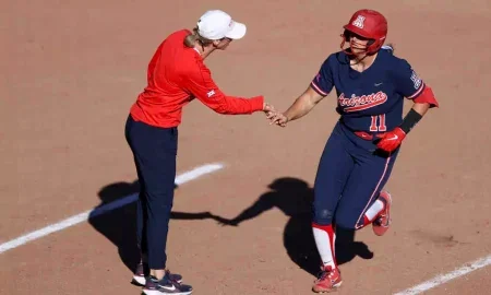 Miranda Stoddard (11), Lauren Lappin, assistant coach - TUCSON, ARIZ. -- Softball vs Ohio, game 4 and day 3 of the Bear Down Fiesta at Rita Hillenbrand Stadium Feb. 15, 2025. Photo by Catherine Regan / Arizona Athletics Photo by Catherine Regan / Arizona Athletics