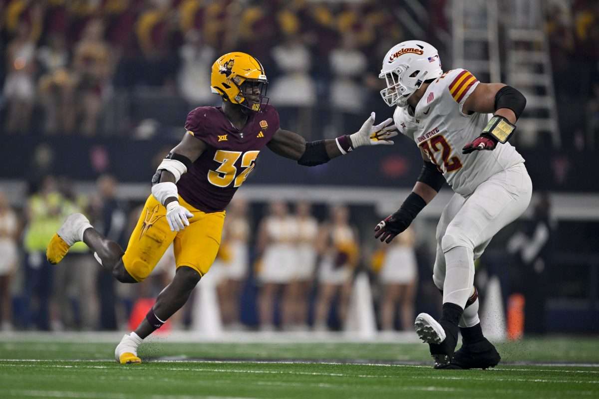 Dec 7, 2024; Arlington, TX, USA; Arizona State Sun Devils defensive lineman Prince Dorbah (32) and Iowa State Cyclones offensive lineman Jalen Travis (72) in action during the game between the Iowa State Cyclones and the Arizona State Sun Devils at AT&T Stadium. Mandatory Credit: Jerome Miron-Imagn Images