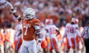 Texas Longhorns defensive back Jahdae Barron celebrates a turnover against Clemson Tigers in thein the first round of the NCAA College Football Playoffs on Dec. 21, 2024, at Darrell K Royal Texas Memorial Stadium in Austin, Texas.