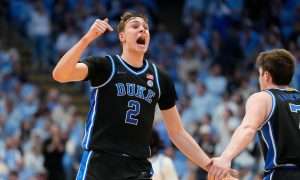 Mar 8, 2025; Chapel Hill, North Carolina, USA; Duke Blue Devils forward Cooper Flagg (2) reacts in the second half at Dean E. Smith Center. Mandatory Credit: Bob Donnan-Imagn Images