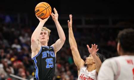 Mar 14, 2025; Kansas City, MO, USA; Brigham Young Cougars forward Richie Saunders (15) shoots the ball during the second half against the Houston Cougars at T-Mobile Center. Mandatory Credit: William Purnell-Imagn Images