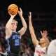 Mar 14, 2025; Kansas City, MO, USA; Brigham Young Cougars forward Richie Saunders (15) shoots the ball during the second half against the Houston Cougars at T-Mobile Center. Mandatory Credit: William Purnell-Imagn Images