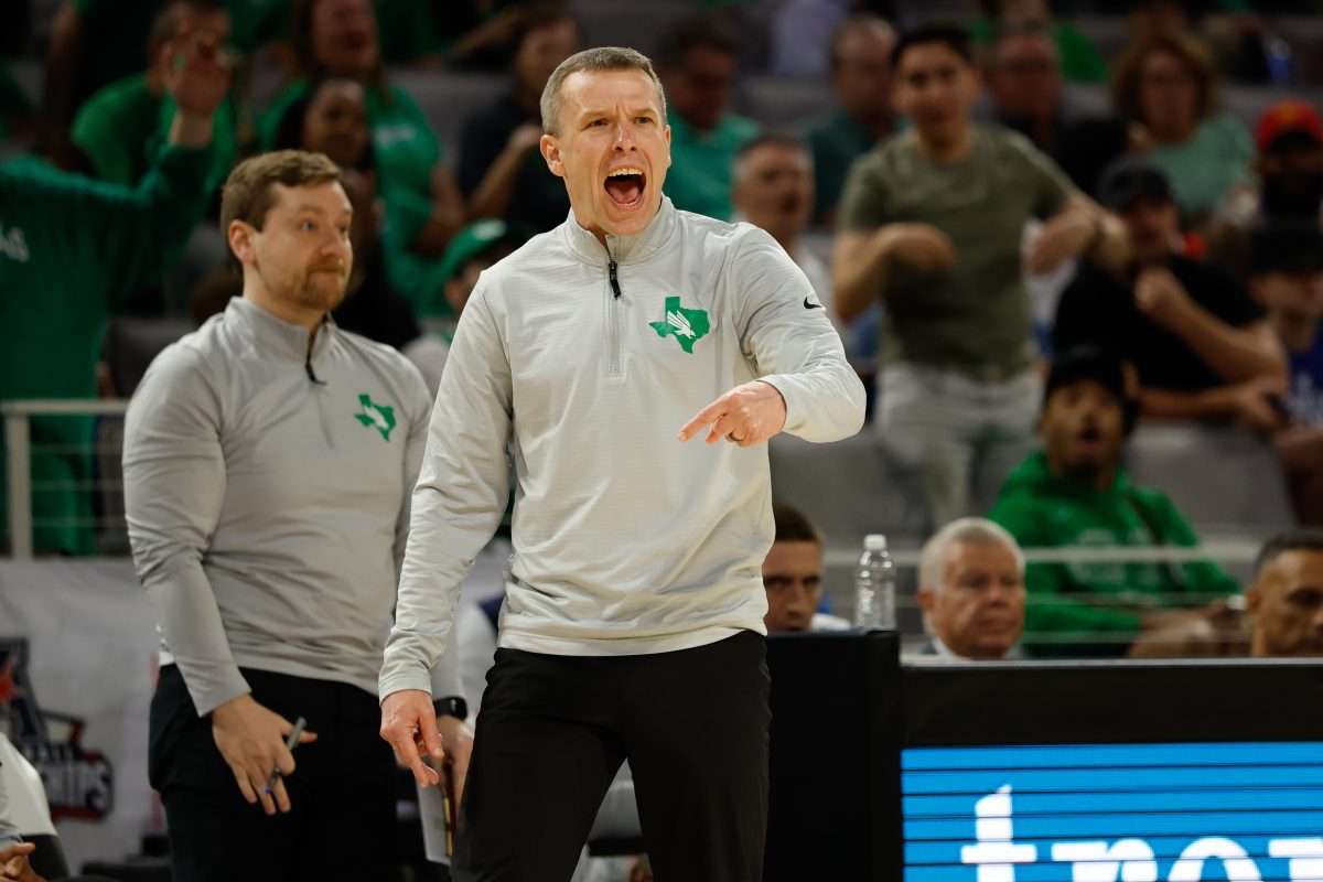 Mar 15, 2025; Fort Worth, TX, USA; North Texas Mean Green head coach Ross Hodge reacts against the UAB Blazers during the first half at Dickies Arena. Mandatory Credit: Chris Jones-Imagn Images