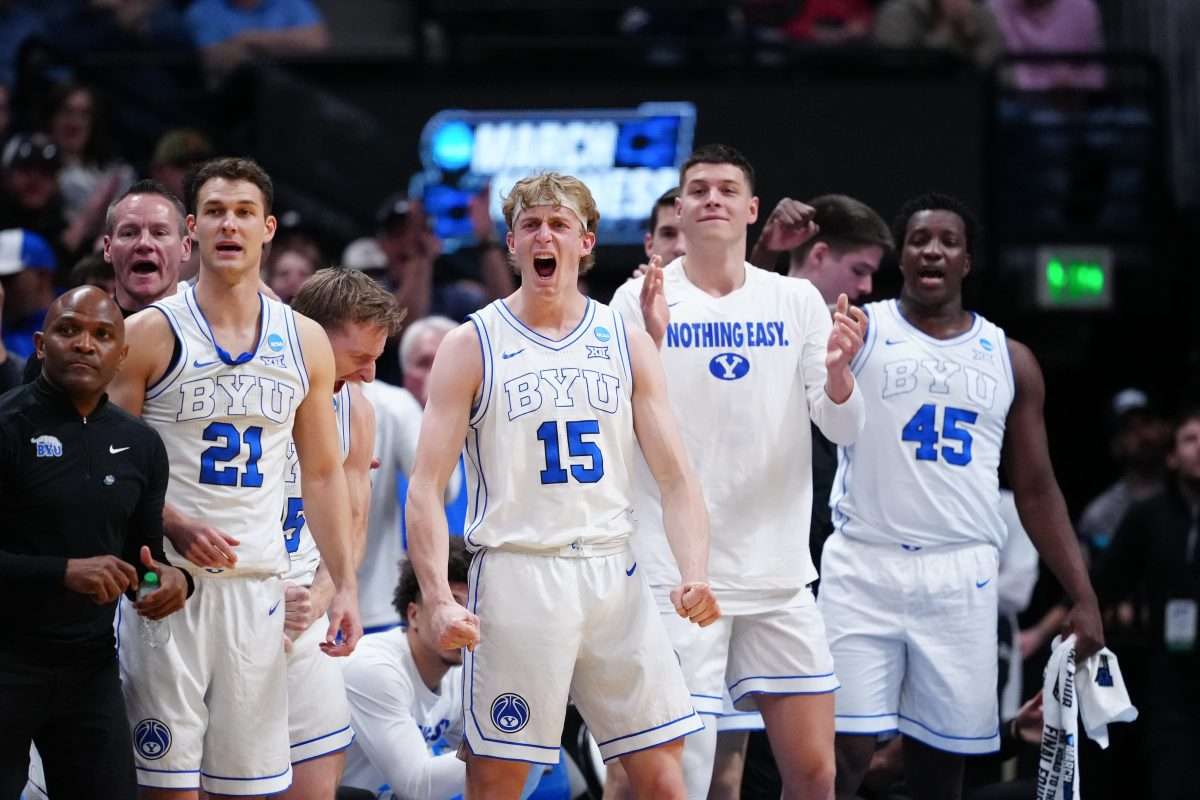 Mar 20, 2025; Denver, CO, USA; The Brigham Young Cougars bench reacts during the first half against the VCU Rams in the first round of the NCAA Tournament at Ball Arena. Mandatory Credit: Ron Chenoy-Imagn Images