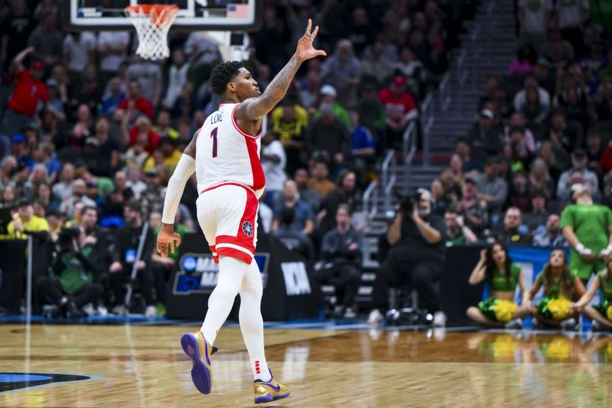 Mar 23, 2025; Seattle, WA, USA; Arizona Wildcats guard Caleb Love (1) reacts in the game against the Oregon Ducks in the second half at Climate Pledge Arena. Mandatory Credit: Steven Bisig-Imagn Images