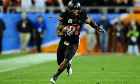 Jan 2, 2012; Glendale, AZ, USA; Oklahoma State Cowboys wide receiver Justin Blackmon (81) runs upfield during the second half against the Stanford Cardinal in the 2012 Fiesta Bowl at University of Phoenix Stadium. The Oklahoma State Cowboys beat the Stanford Cardinal 41-38 in overtime. Mandatory Credit: Matt Kartozian-USA TODAY Sports