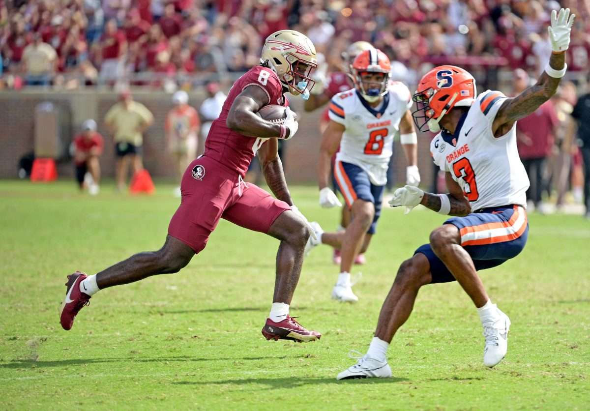 Oct 14, 2023; Tallahassee, Florida, USA; Florida State Seminoles wide receiver Hykeem Williams (8) scores a touchdown during the second half against the Syracuse Orange at Doak S. Campbell Stadium. Mandatory Credit: Melina Myers-USA TODAY Sports