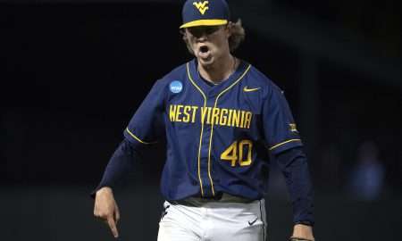 Jun 8, 2024; Chapel Hill, NC, USA; West Virginia Mountaineers pitcher Carson Estridge (40) reacts to getting an out against the North Carolina Tar Heels in the eighth inning of the DI Baseball Super Regional at Boshamer Stadium. Mandatory Credit: Jeffrey Camarati-USA TODAY Sports