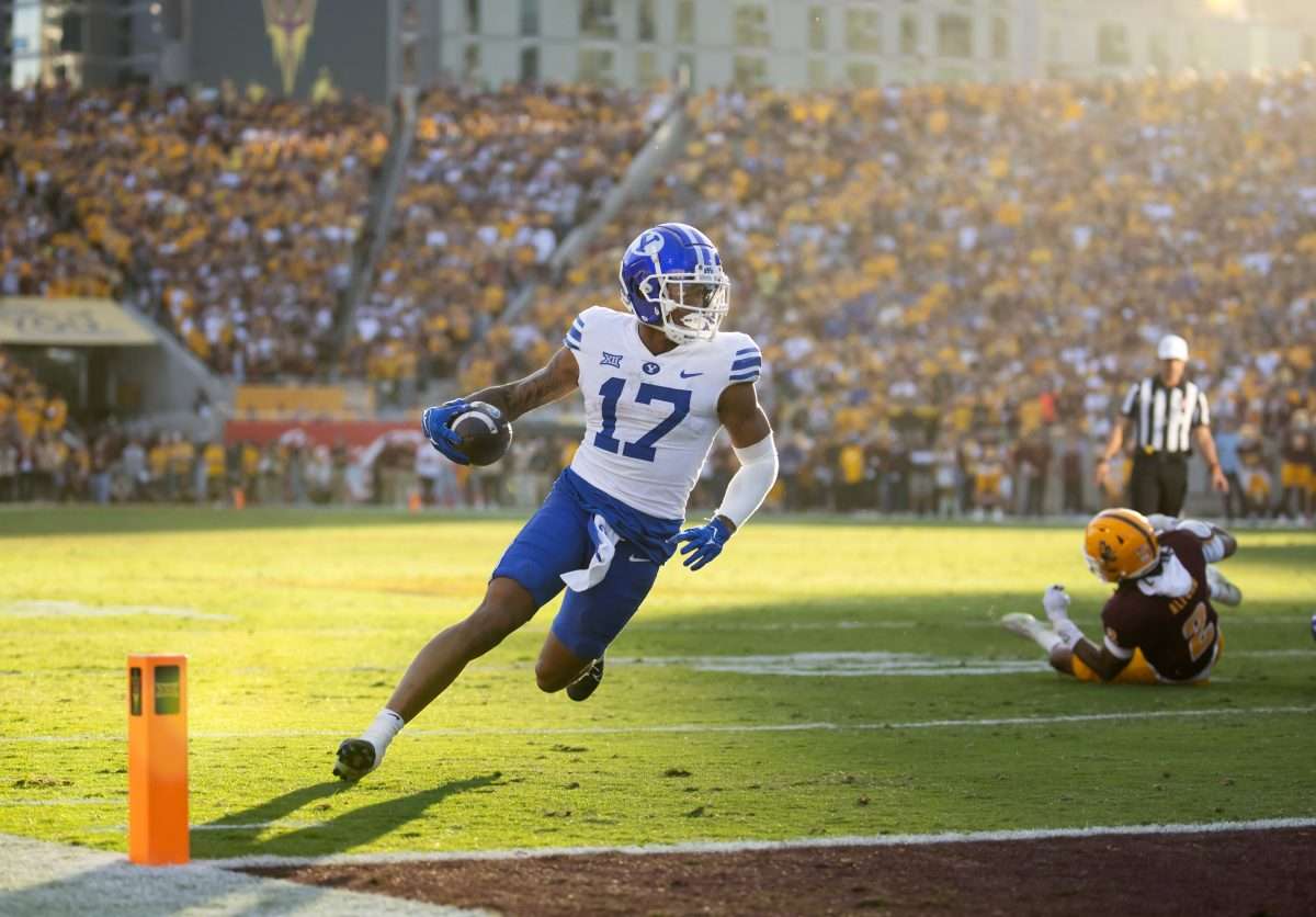 Nov 23, 2024; Tempe, Arizona, USA; Brigham Young Cougars wide receiver Keelan Marion (17) scores a touchdown against the Arizona State Sun Devils at Mountain America Stadium. Mandatory Credit: Mark J. Rebilas-Imagn Images