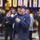 Feb 19, 2025; Morgantown, West Virginia, USA; West Virginia Mountaineers head football coach Rich Rodriguez speaks to the crowd during a timeout during the first half against the Cincinnati Bearcats at WVU Coliseum. Mandatory Credit: Ben Queen-Imagn Images