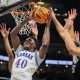 Mar 12, 2025; Kansas City, MO, USA; Kansas Jayhawks forward Flory Bidunga (40) shoots the ball during the first half against the UCF Knights at T-Mobile Center. Mandatory Credit: William Purnell-Imagn Images