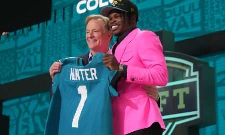 Apr 24, 2025; Green Bay, WI, USA; NFL commissioner Roger Goodell stands with Colorado Buffaloes wide receiver Travis Hunter after he is selected by the Jacksonville Jaguars as the number two pick in the first round of the 2025 NFL Draft at Lambeau Field. Mandatory Credit: Kirby Lee-Imagn Images