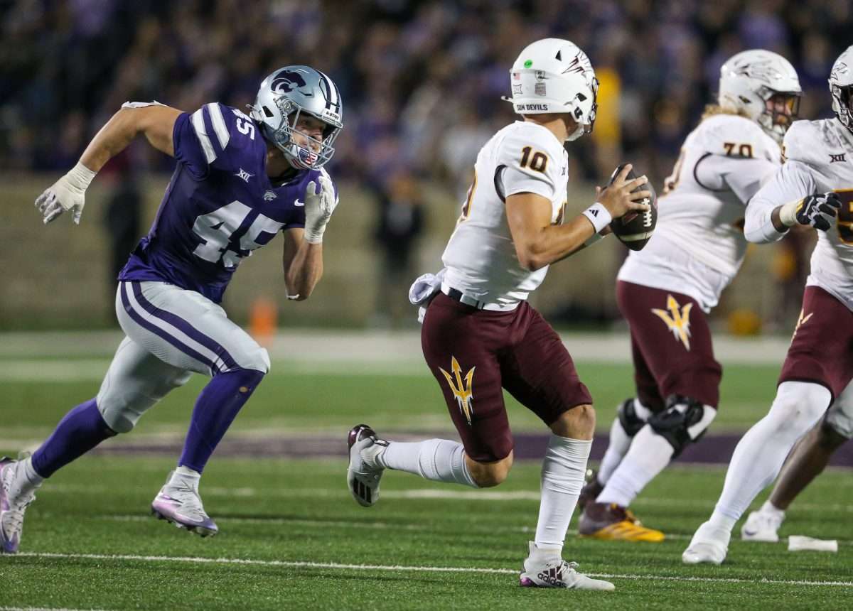 Nov 16, 2024; Manhattan, Kansas, USA; Kansas State Wildcats linebacker Austin Romaine (45) chases Arizona State Sun Devils quarterback Sam Leavitt (10) during the third quarter at Bill Snyder Family Football Stadium. Mandatory Credit: Scott Sewell-Imagn Images