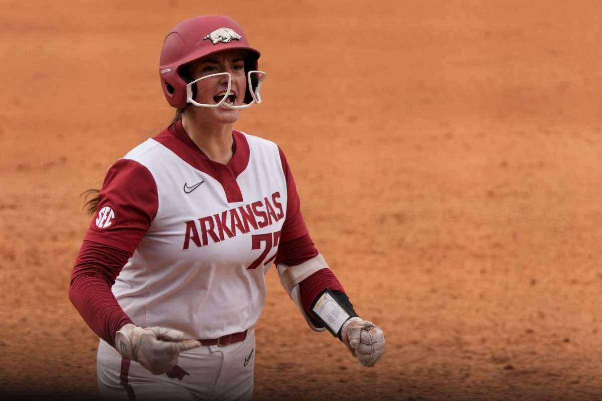 Arkansas infielder Bri Ellis (77) celebrates after hitting a walkout grand slam to win the game during a SEC softball tournament second round game against Georgia in Athens, Ga., on Wednesday, May 7, 2025. Arkansas won 5-1.