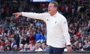 Mar 20, 2025; Providence, RI, USA; Kansas Jayhawks head coach Bill Self reacts during the second half against the Arkansas Razorbacks at Amica Mutual Pavilion. Mandatory Credit: Gregory Fisher-Imagn Images