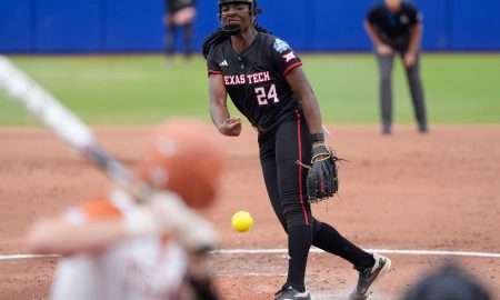 Texas Tech pitcher NiJaree Canady (24) throws a pitch during Game 1 of the Women's College World Series championship series between the Texas Longhorns at Texas Tech Red Raiders at Devon Park in Oklahoma City, Wednesday, June 4, 2025. Texas won 2-1.