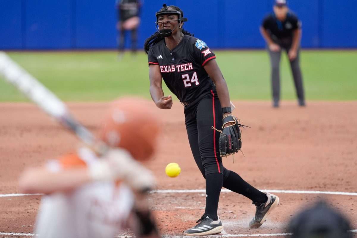 Texas Tech pitcher NiJaree Canady (24) throws a pitch during Game 1 of the Women's College World Series championship series between the Texas Longhorns at Texas Tech Red Raiders at Devon Park in Oklahoma City, Wednesday, June 4, 2025. Texas won 2-1.