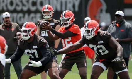 Browns quarterback Shedeur Sanders takes a snap during minicamp, Tuesday, June 10, 2025, in Berea.