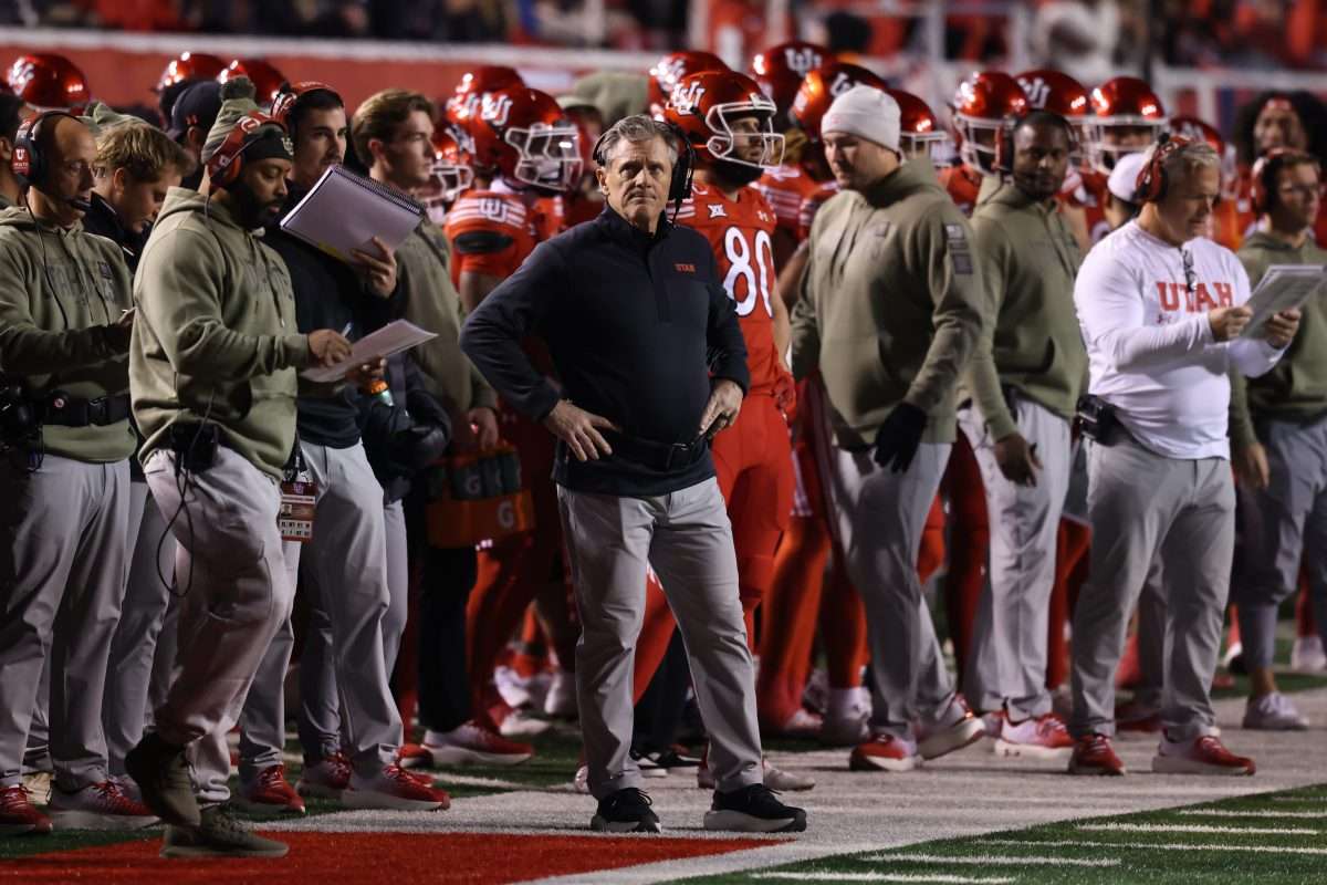 Nov 9, 2024; Salt Lake City, Utah, USA; Utah Utes head coach Kyle Whittingham takes a look at the scoreboard during the second quarter against the Brigham Young Cougars at Rice-Eccles Stadium. Mandatory Credit: Rob Gray-Imagn Images