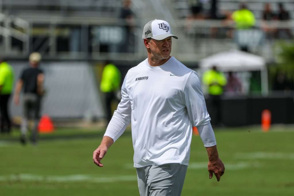 Sep 20, 2025; Orlando, Florida, USA; UCF Knights head coach Scott Frost looks on during warmups before the game against the North Carolina Tar Heels at the Bounce House Stadium. Mandatory Credit: Mike Watters-Imagn Images