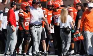Sep 27, 2025; Stillwater, Oklahoma, USA; Oklahoma State Cowboys interim coach Doug Meacham on the sidelines during the first half against the Baylor Bears at Boone Pickens Stadium. Mandatory Credit: William Purnell-Imagn Images