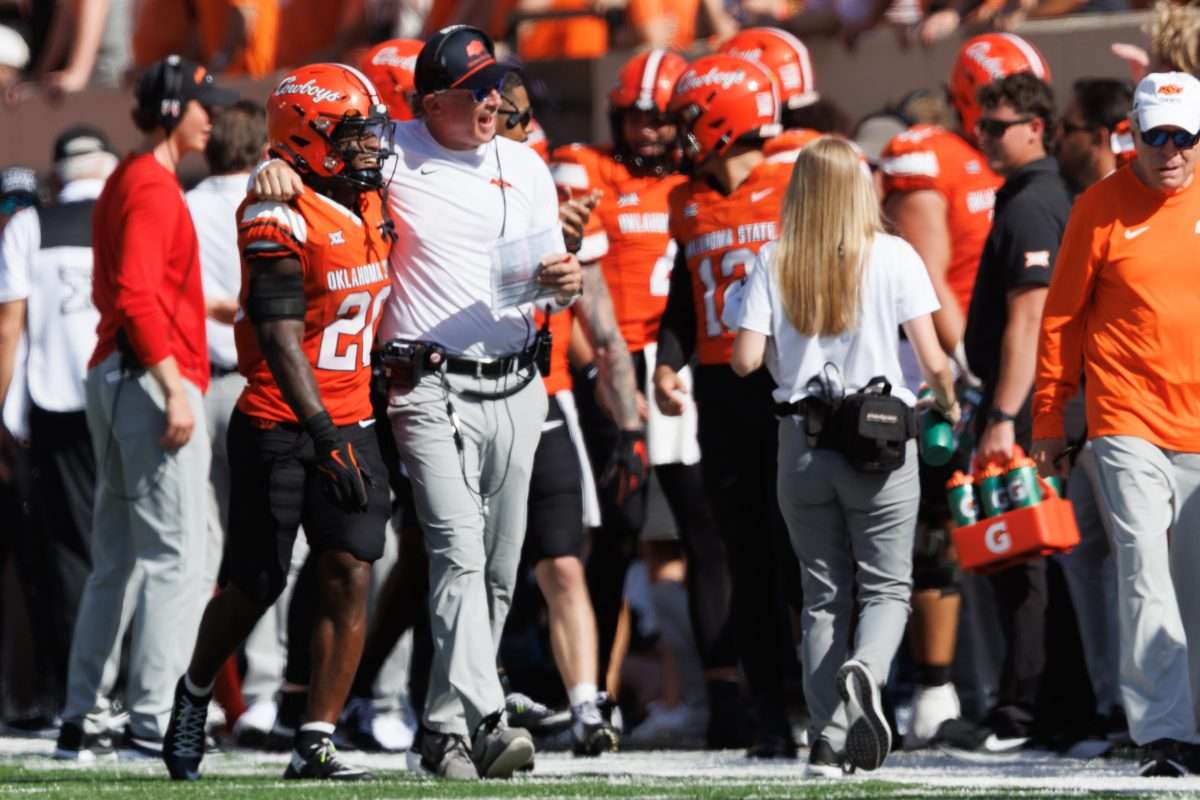 Sep 27, 2025; Stillwater, Oklahoma, USA; Oklahoma State Cowboys interim coach Doug Meacham on the sidelines during the first half against the Baylor Bears at Boone Pickens Stadium. Mandatory Credit: William Purnell-Imagn Images