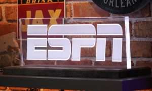Feb 5, 2025; New Orleans, LA, USA; The ESPN logo at the Super Bowl LIX media center at the Ernest N. Morial Convention Center. Mandatory Credit: Kirby Lee-Imagn Images