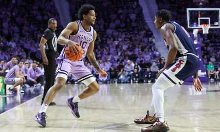 Feb 11, 2025; Manhattan, Kansas, USA; Kansas State Wildcats guard David Castillo (10) dribbles against Arizona Wildcats guard Jaden Bradley (0) during the first half at Bramlage Coliseum. Mandatory Credit: Scott Sewell-Imagn Images