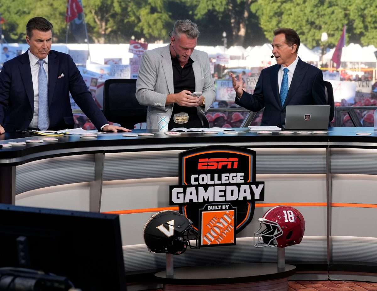 Oct. 4, 2025; Tuscaloosa, Alabama, USA; Rece Davis, Pat McAfee and Nick Saban interact on the set of ESPN’s College GameDay on location on the Quad at the University of Alabama before the Alabama versus Vanderbilt game.