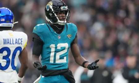 Oct 19, 2025; London, United Kingdom; Jacksonville Jaguars wide receiver Travis Hunter (12) reacts after a play against the Los Angeles Rams during the second half of an NFL International Series game at Wembley Stadium. Mandatory Credit: Kirby Lee-Imagn Images