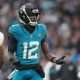 Oct 19, 2025; London, United Kingdom; Jacksonville Jaguars wide receiver Travis Hunter (12) reacts after a play against the Los Angeles Rams during the second half of an NFL International Series game at Wembley Stadium. Mandatory Credit: Kirby Lee-Imagn Images