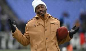 Jan 20, 2024; Baltimore, MD, USA; ESPN college football and NFL analyst Robert Griffin III reacts on the sidelines before a 2024 AFC divisional round game between the Houston Texans and the Baltimore Ravens at M&T Bank Stadium. Mandatory Credit: Tommy Gilligan-USA TODAY Sports