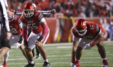 Oct 11, 2025; Salt Lake City, Utah, USA; Utah Utes offensive lineman Spencer Fano (55) and Utah Utes offensive lineman Michael Mokofisi (52) wait for the play during the third quarter of the game against the Arizona State Sun Devils at Rice-Eccles Stadium. Mandatory Credit: Rob Gray-Imagn Images