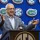 Oct 15, 2025; Birmingham, AL, USA; SEC commissioner Greg Sankey introduces Florida Gators head coach Todd Golden during SEC Media Days at Grand Bohemian Hotel. Mandatory Credit: Vasha Hunt-Imagn Images
