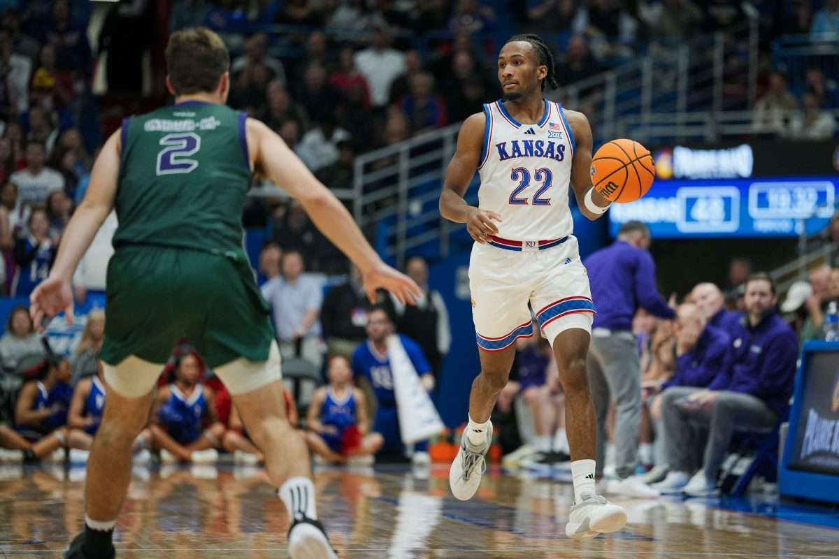 Nov 3, 2025; Lawrence, Kansas, USA; Kansas Jayhawks guard Darryn Peterson (22) dribbles the ball during the second half against the Green Bay Phoenix at Allen Fieldhouse. Mandatory Credit: Jay Biggerstaff-Imagn Images
