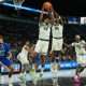 Nov 24, 2025; Las Vegas, Nevada, USA; Baylor Bears center Caden Powell (44) and guard Tounde Yessoufou (24) go up for the rebound as Creighton Bluejays forward Owen Freeman (32) looks on during the second half in a 2025 Players Era Festival group play game at Michelob Ultra Arena. Mandatory Credit: Kirby Lee-Imagn Images
