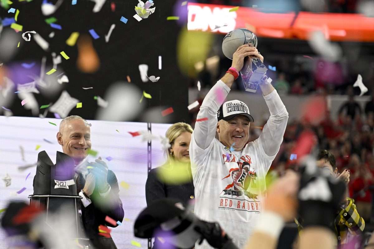 Dec 6, 2025; Arlington, TX, USA; Texas Tech Red Raiders head coach Joey McGuire celebrates after the win against the BYU Cougars at AT&T Stadium. Mandatory Credit: Jerome Miron-Imagn Images