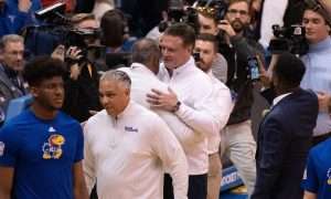 Kansas coach Bill Self meets Kansas State coach Jerome Tang before the two battle in Tuesday night in the Sunflower Showdown inside Allen Fieldhouse.
