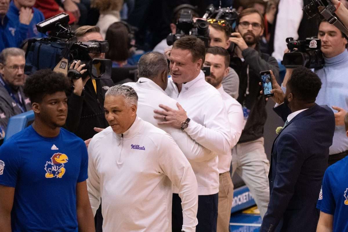 Kansas coach Bill Self meets Kansas State coach Jerome Tang before the two battle in Tuesday night in the Sunflower Showdown inside Allen Fieldhouse.