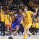 Jan 10, 2026; Morgantown, West Virginia, USA; Kansas Jayhawks guard Darryn Peterson (22) drives baseline past West Virginia Mountaineers guard Treysen Eaglestaff (52) during the first half at Hope Coliseum. Mandatory Credit: Ben Queen-Imagn Images