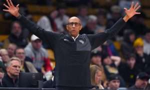 Jan 24, 2026; Boulder, Colorado, USA; UCF Knights head coach Johnny Dawkins calls out in the second half against the Colorado Buffaloes at the CU Events Center. Mandatory Credit: Ron Chenoy-Imagn Images