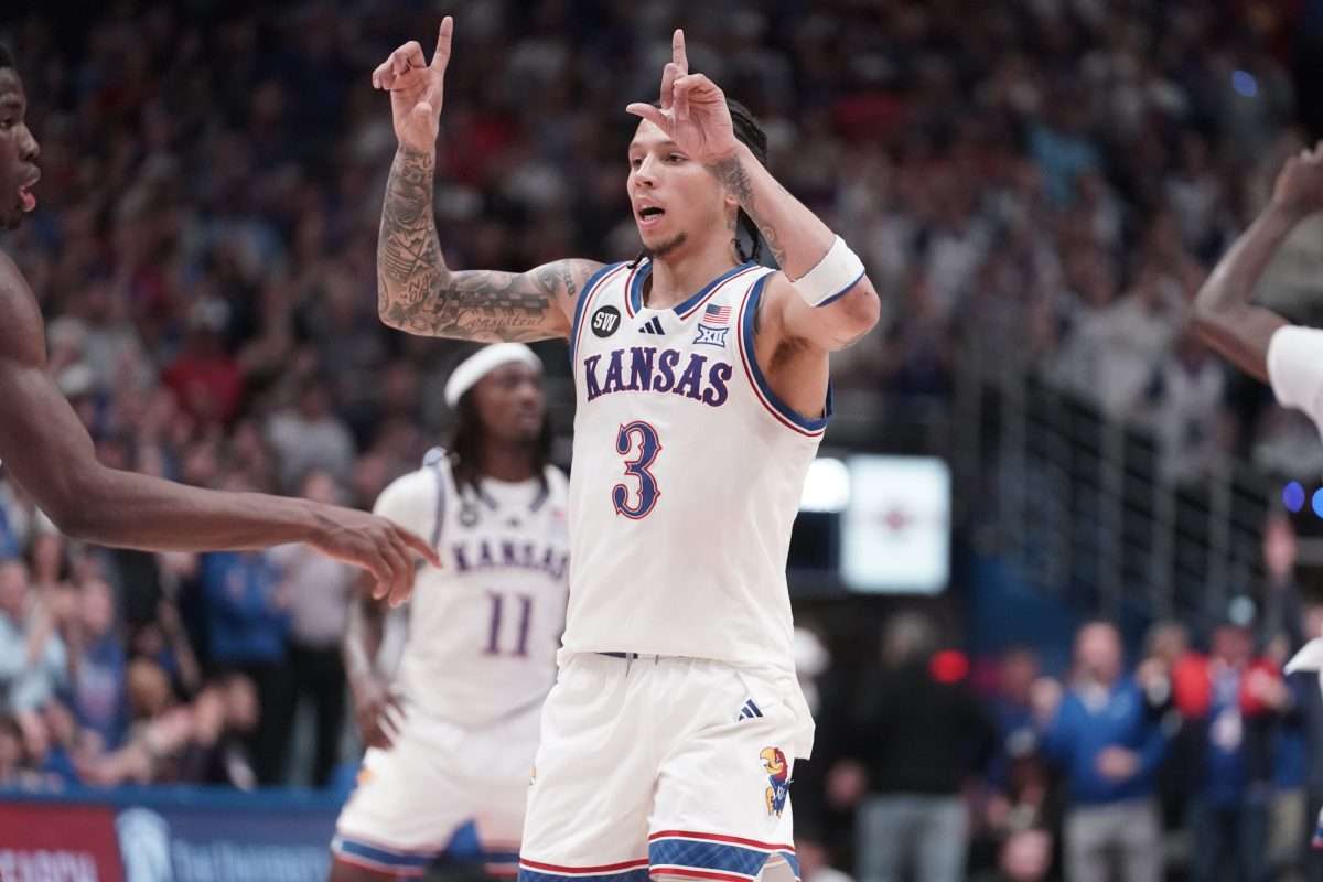 Kansas Jayhawks guard Tre White (3) calls out a play after scoring a free throw against Arizona Wildcats during the game inside Allen Fieldhouse on Feb. 9, 2026.