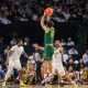 Feb 28, 2026; Orlando, Florida, USA; Baylor Bears guard Isaac Williams (10) shoots a three point basket in front of UCF Knights guard Themus Fulks (1) during the first half at Addition Financial Arena. Mandatory Credit: Mike Watters-Imagn Images